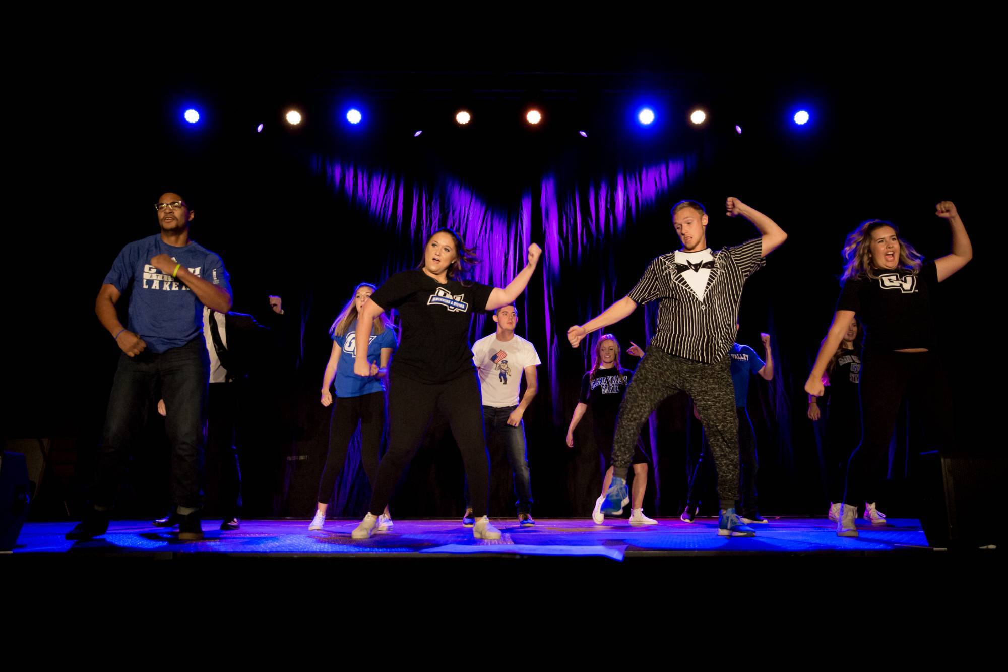 GVSU students dancing on a stage